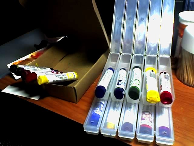 Product photo of 15 Daniel Smith watercolor sticks in cardboard box and two plastic cases.